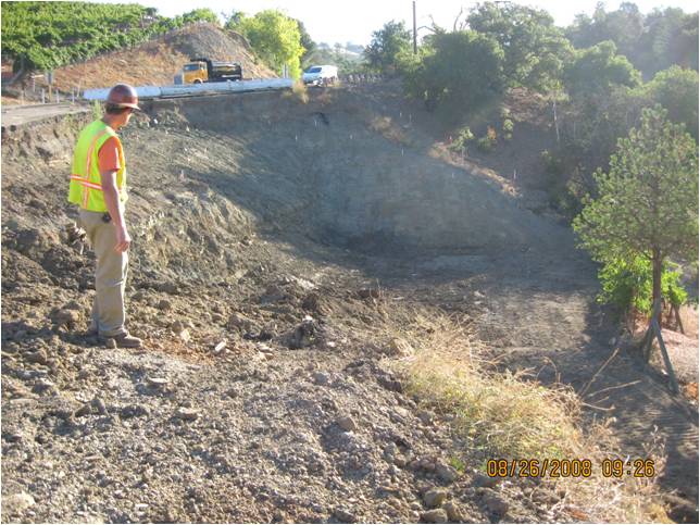 Excavation of failed road section.