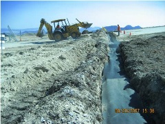 Geotextile placement over TDA in gas collection trench