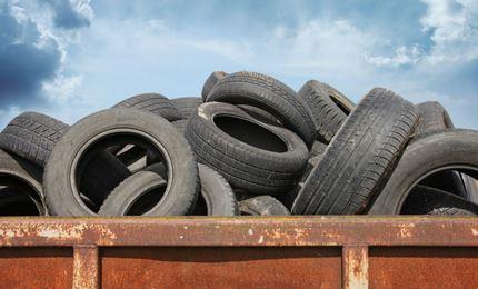 Dumpster of old, used tires