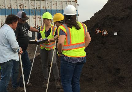 CalRecycle Staff inspect compost pile temperatures at a compost facility