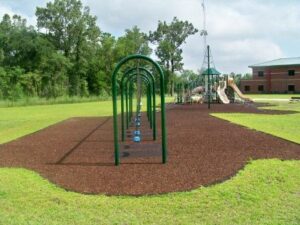 Play area swing mats made from recycled tires