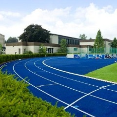 Blue rubberized running track made from crumb rubber