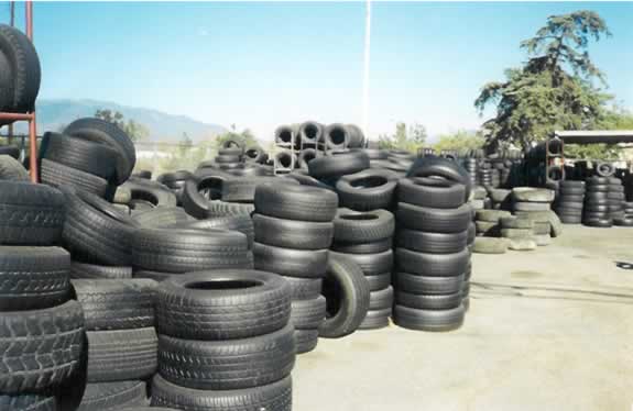 Waste tires in vertical barrel stacks