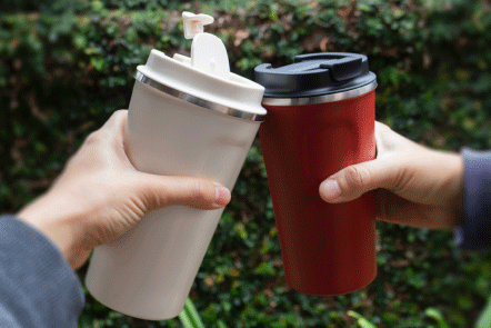 two reusable tumblers with lids