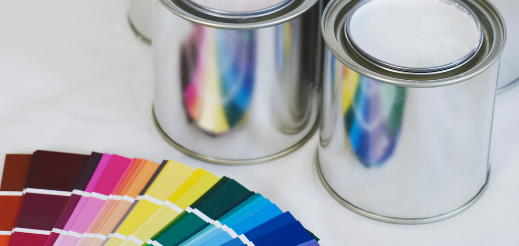 Cans of paint and color swatches