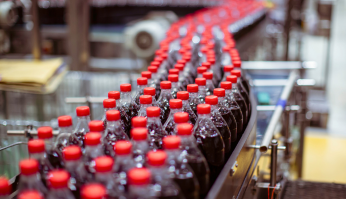 plastic bottles in manufacturing machine