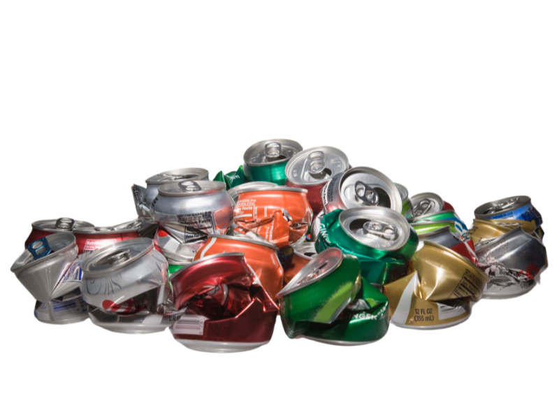 The image captures a colorful assortment of crushed aluminum cans, ready for recycling, against a stark white background.